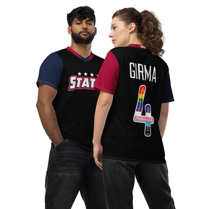 May include: Two people wearing black basketball jerseys with red and blue accents. The jersey on the left has the word "STAT" and stars on it. The jersey on the right has the name "GIRMA" and the number "4" with a rainbow design. Both jerseys have the word "USA" on them.