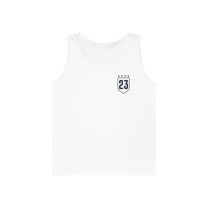 May include: White sleeveless tank top with a navy blue shield-shaped patch featuring the number 23 and five stars above it.