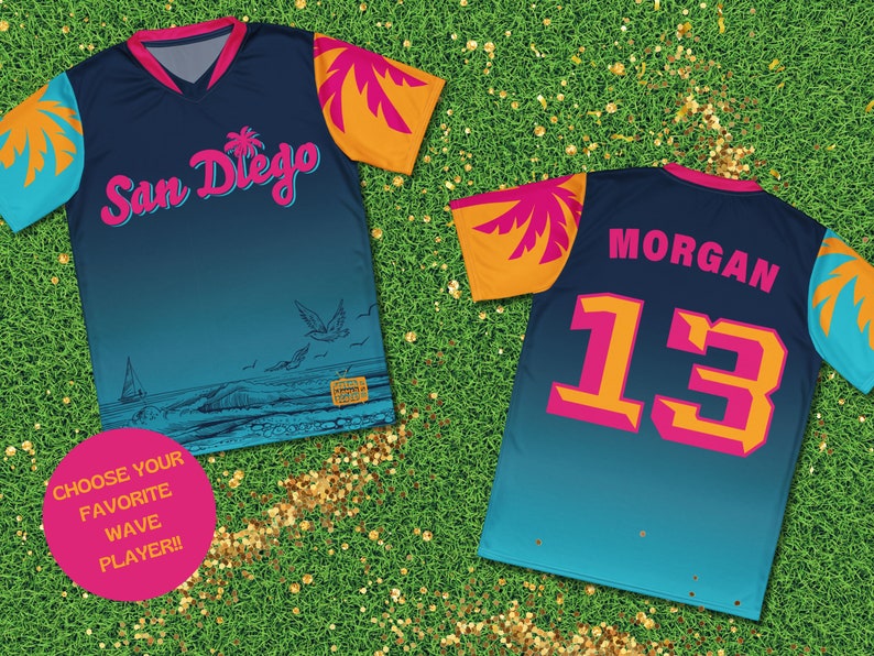 May include: Two blue, orange, and pink sublimated sports jerseys with palm tree graphics. The front jersey has "San Diego" written in pink script. The back jersey has "MORGAN 13" in pink and orange.