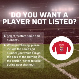 May include: A red sweatshirt with the text "SINCLAIR" and the number "12" on the back. The sweatshirt is on a green field with white lines. The text "DO YOU WANT A PLAYER NOT LISTED?" is at the top of the image. The text "Select "custom name and number"" and "When purchasing, please include the name and number you would like on the back of the clothing in the section "notes to seller" during your checkout." is at the bottom of the image.