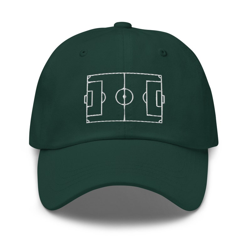 May include: A dark green baseball cap with a white embroidered outline of a football pitch.