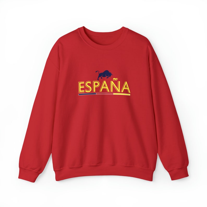 May include: Red sweatshirt with a yellow "ESPA&Ntilde;A" graphic and a black bull silhouette above the text. The bull has a red tongue and a yellow tail.