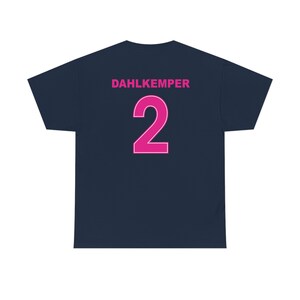 May include: Navy blue t-shirt with the name "DAHLKEMPER" and the number "2" printed on the back in pink.
