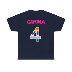 May include: Navy blue t-shirt with the name "GIRMA" and the number "4" in rainbow colours on the back.