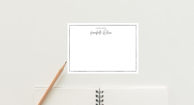 May include: A white note card with a black border and the text "A note from Annabelle Wilson" at the top.