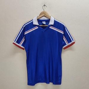 80-tals ADIDAS ORIGINALS X Decente France Trefoil Vintage Kläder Nummer 6 Stor Logo Blå Vit Röd Randig Kortärmad Krag-Röd Halsringning Tröja