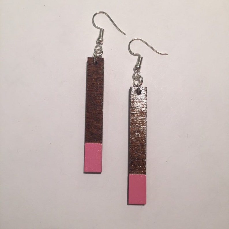 RECTANGULAR WOODEN EARRINGS, hand painted, pink coloured tips with natural wood top section, thin shape, varnish finish, ethically produced image 2