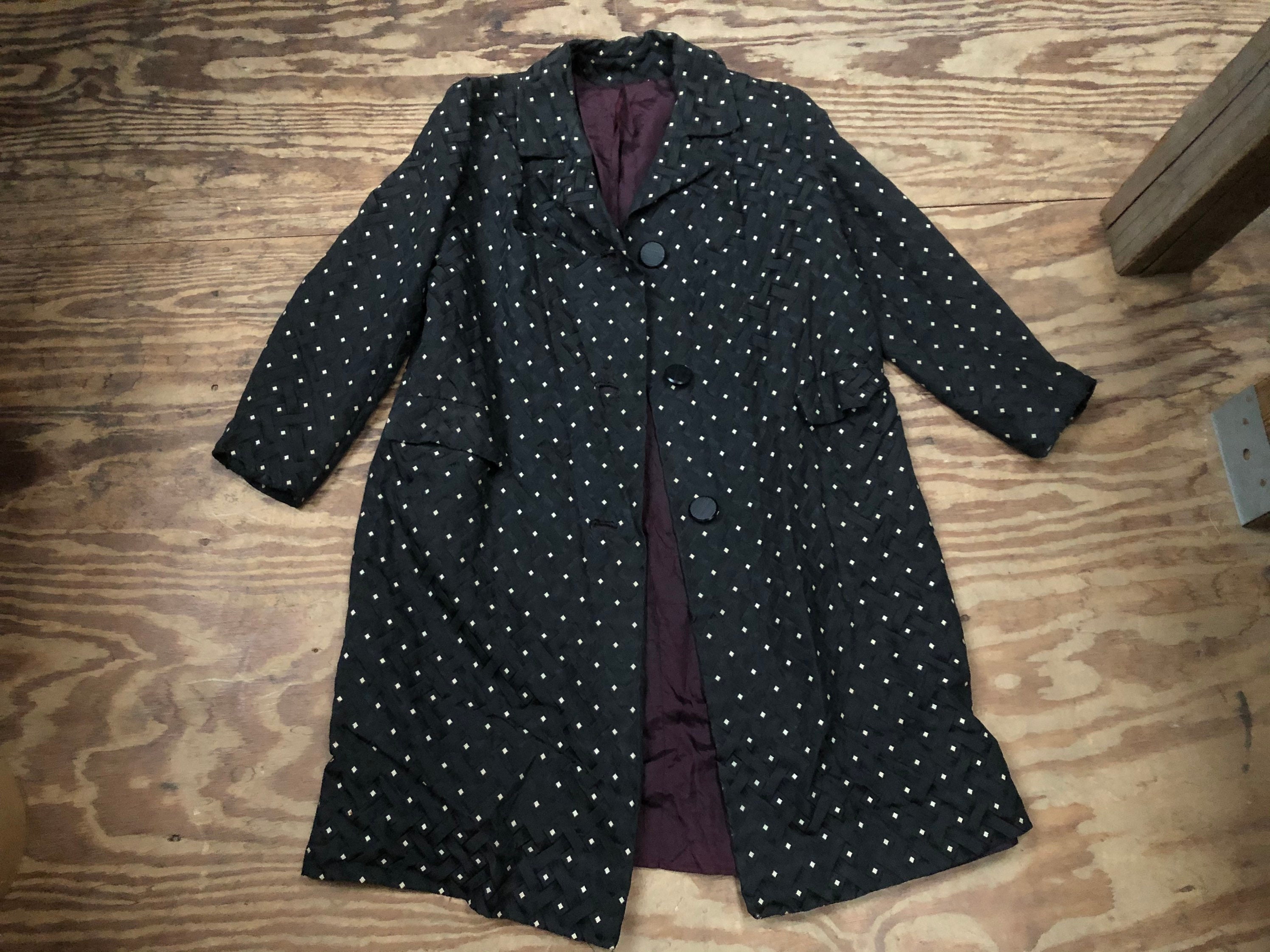 yellow polka dot rain jacket