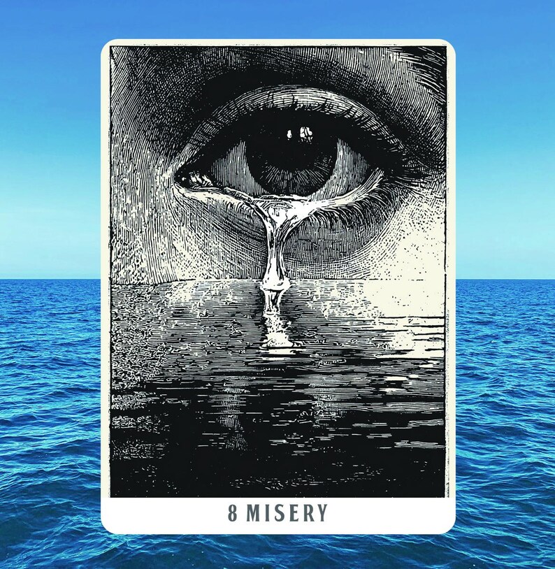 May include: A black and white illustration of a crying eye with a tear falling into water. The card is labeled "8 MISERY" at the bottom. The background is a blue sky and ocean.