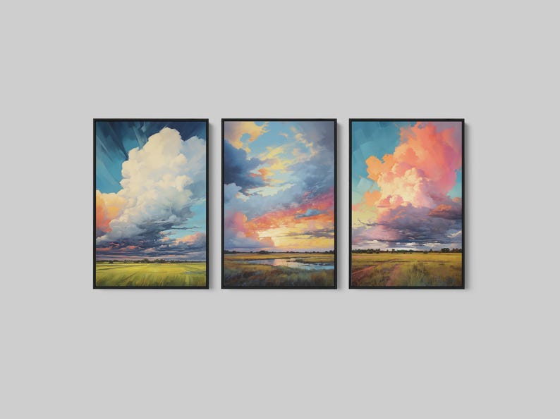 Gallery wall set with three Western storm landscape artworks, bold cloud-filled skies, and wood framed canvas print styling for farmhouse interiors.
