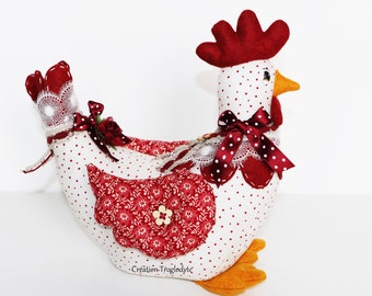 Poule rouge et blanche en tissu, lestée de sable en cale porte ou simplement pour la décoration de cuisine, de salon, d'entrée.