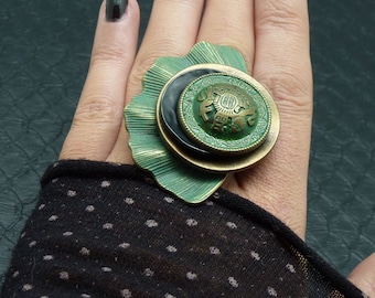 Large, patinated, oxidized green, bronze, and black metal ring with a green Gingko design - Kumka