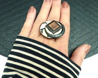 Graphic ring in metal, wood, paper, ecru black and copper PARADOX S adjustable