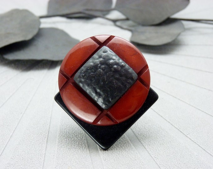 Large graphic black and burgundy resin and metal QUADRIA adjustable ring