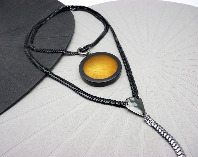 Necklace with large removable yellow-orange pendant, SOLARIUM graphic