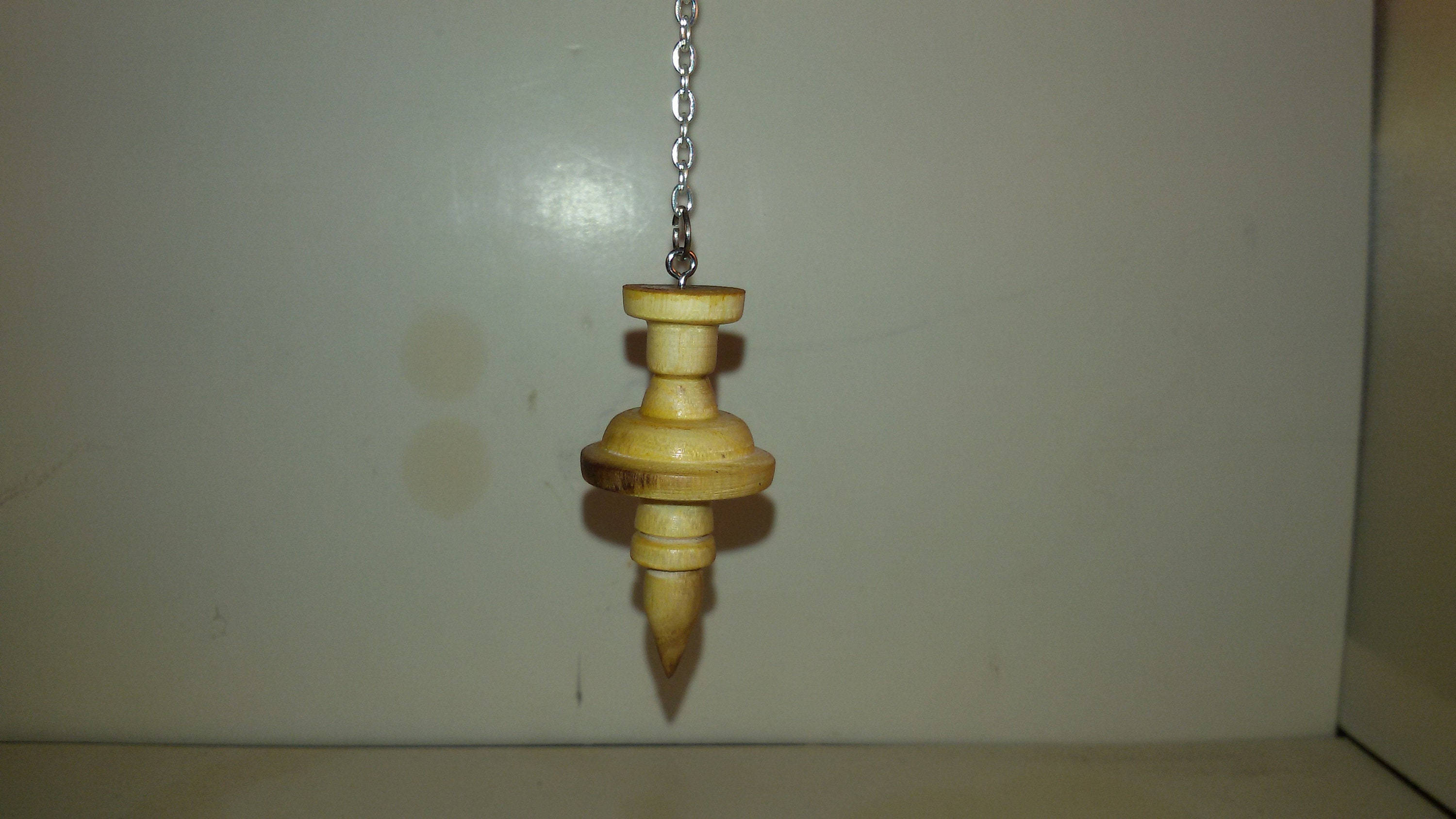 Pendule en Bois d'acacia. Pcaca5