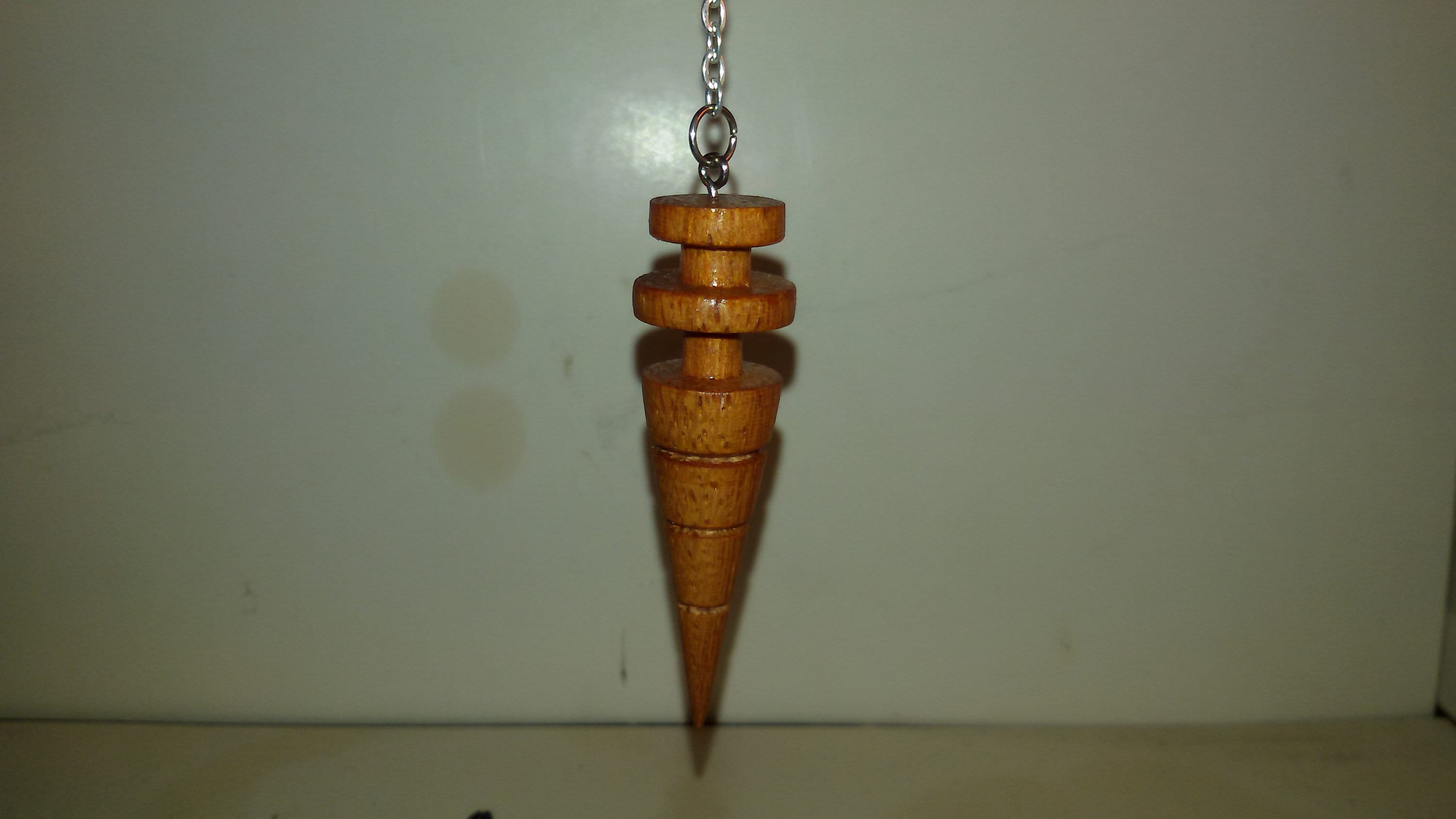 Pendule en Bois de Piquia. Pcaca5