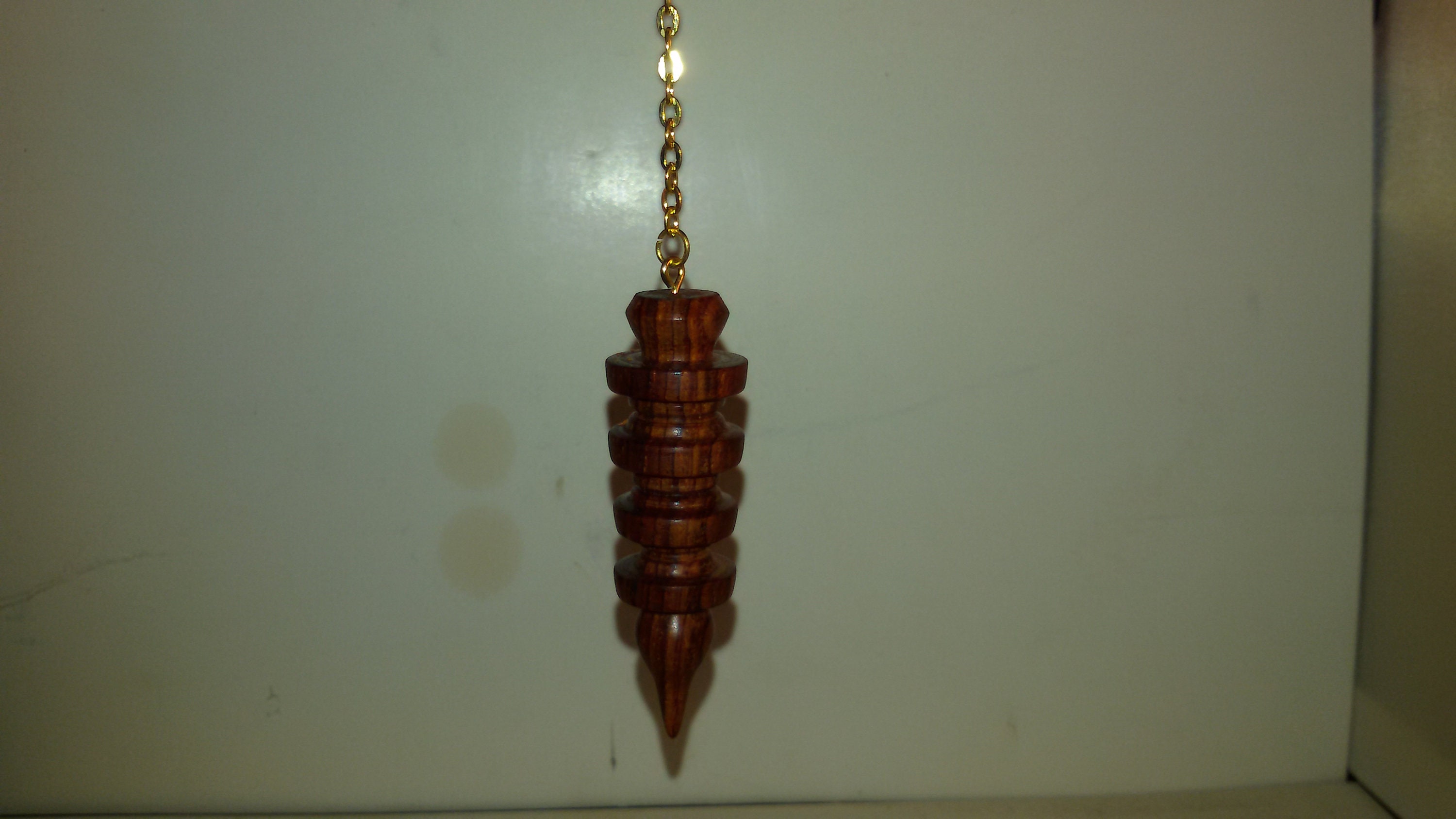 Pendule en Bois de Cocobollo. P Coco1