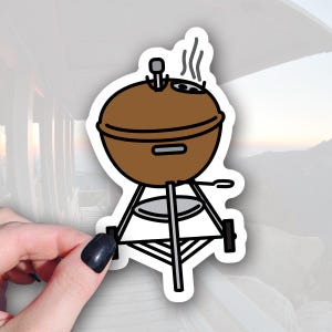 sticker of a copper color weber kettle grill