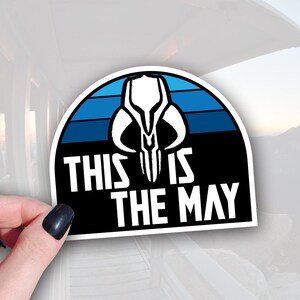 This is the May - Mandalorian Inspired Star Wars Sticker - Waterproof Decal for Sci-Fi Fans