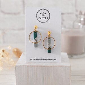 Hashi earrings. Bacchetta Clear Lagoon. Earrings with metal hoop and wooden pendant