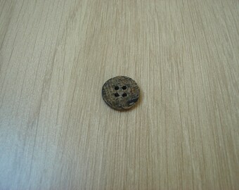Brown and beige Horn button