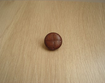 brass tail caramel leather button