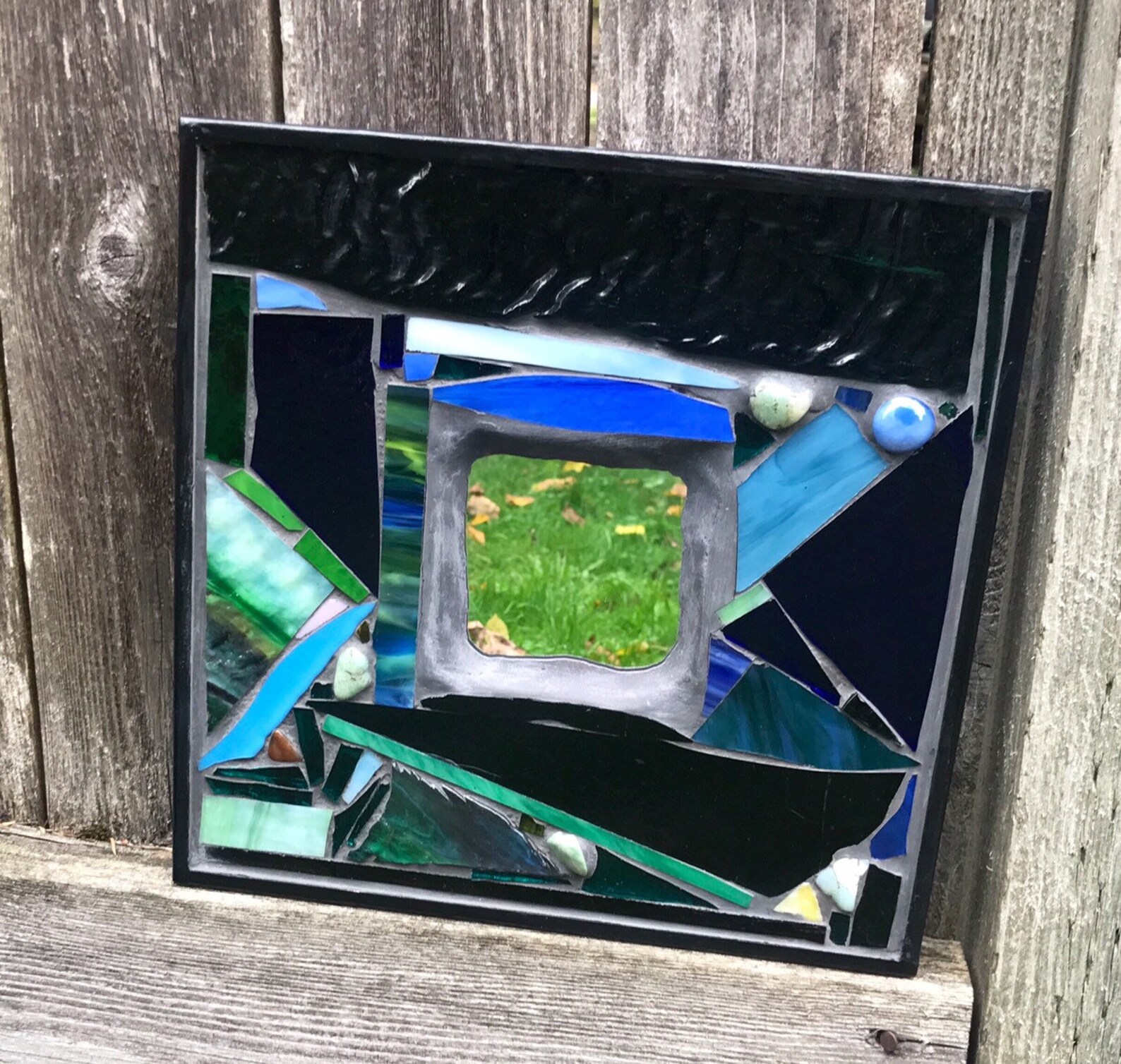 A closer look at Textured Glass Wall Mirror With Mosaic Artwork