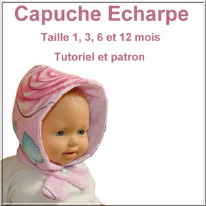 May include: A pink hooded scarf with a rose pattern worn by a doll. The text reads Capuche Echarpe, Taille 1, 3, 6 et 12 mois, Tutoriel et patron. The hood features a light pink interior lining and a single button closure at the neck area.