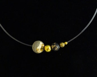 Collier avec perle en béton, bijou contemporain, "La Ronde galactique..."