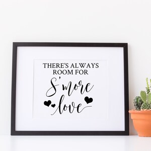 May include: Black and white framed print with the text "There's always room for s'more love" with two small hearts on either side of the word "love".