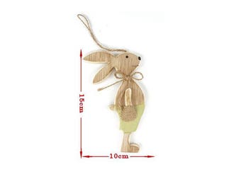 Easter wooden bunny decoration with burlap pocket and drawstring. Shorts in green paint. Size about 15cm