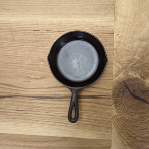 Lodge #3 3 notch cast iron skillet.