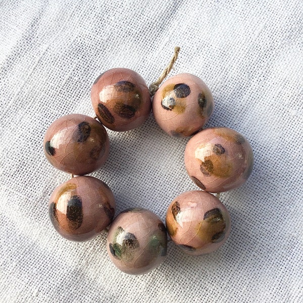 Perles en Céramique  Artisanales  rose à motifs