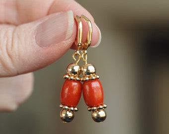 Red coral earrings - red coral with gold-colored hematite on gold-plated French earwires - small red earrings with coral