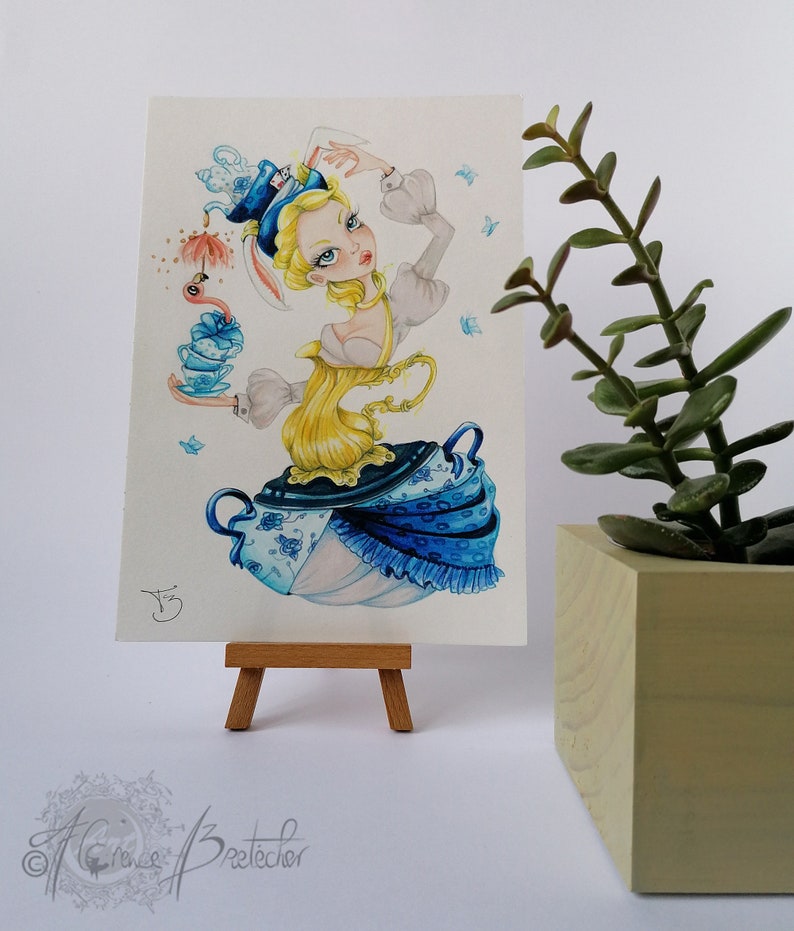 May include: A watercolor painting of a whimsical character wearing a teacup hat and holding a teapot. The character is surrounded by teacups and butterflies. The painting is on a small easel.