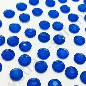 Strass Hotfix FLUORESCENTI BLU - Fluorescenti sotto lampada UV nera - Grossista di strass - Piccole e grandi quantità
