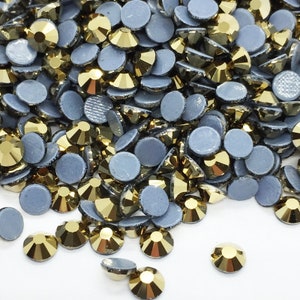 Strass termoadesivi in EMATITE DORATA - Strass in vetro da 2 mm a 6 mm - Grossisti di strass - Piccole e grandi quantità