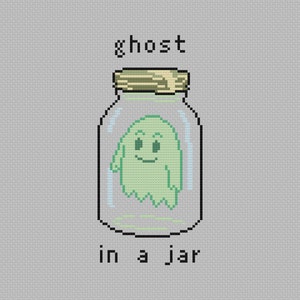 May include: A green ghost with a smiling face is trapped inside a clear glass jar with a brown lid. The text "ghost in a jar" is written below the jar.