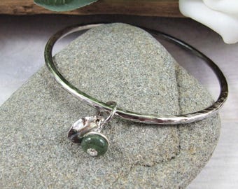 Sterling Silver Bangle with Leaf and Natural Emerald Charms.
