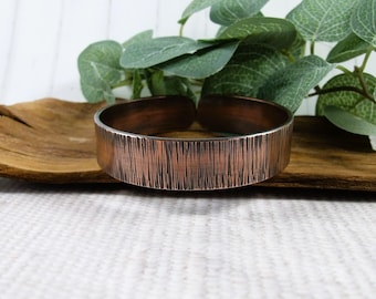 Wide Heavy Copper Bangle: Line Textured Antiqued Finish.  Size 20cms Circumference.