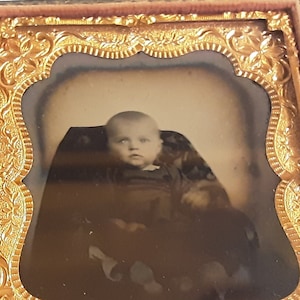 Ambrotype photo book of a young toddler boy from the 1850s