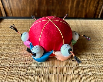 Vintage Chinese Pin Cushion with Doll Mini Figures on Red Silk