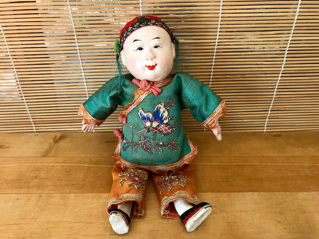 Antique Chinese Paper Mache Boy Doll With Decorative Silk Clothing