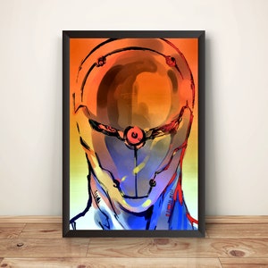 Op de afbeelding: Abstracte kunstprint in een zwarte lijst. Het kunstwerk toont een gestileerde robotkop met een levendig kleurenpalet van oranje, blauw en rood. De print wordt gepresenteerd op een houten vloer.