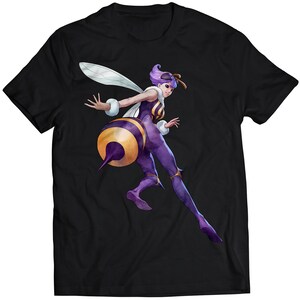 May include: Black t-shirt featuring a purple-haired woman with bee wings and a yellow and black bee body.