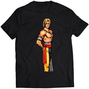 Könnte beinhalten: Schwarzes T-Shirt mit einer Cartoon-Illustration eines muskulösen Mannes mit blonden Haaren, der einen gelben und roten gestreiften Lendenschurz trägt.