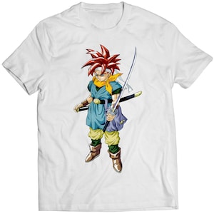 May include: White t-shirt featuring a cartoon image of a red-haired character holding a sword. The character is wearing a blue and white outfit and has a white headband.