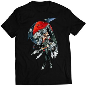 May include: Black t-shirt with a graphic print of a female character with a red and black mask, holding a weapon. The character is standing in front of a large, red, and black orb.