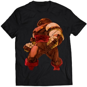 May include: Black t-shirt with a graphic of the Marvel Comics character, The Juggernaut, in a red and brown color scheme.
